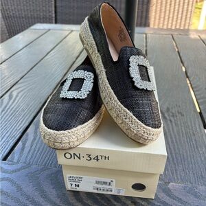 Women’s black Raffia slip on with sparkle detail. Brand new never worn